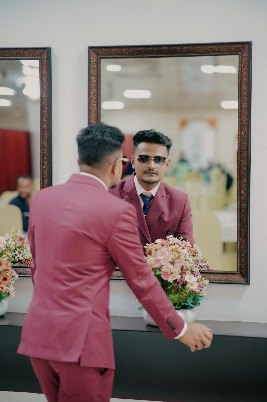 man practicing speech in mirror