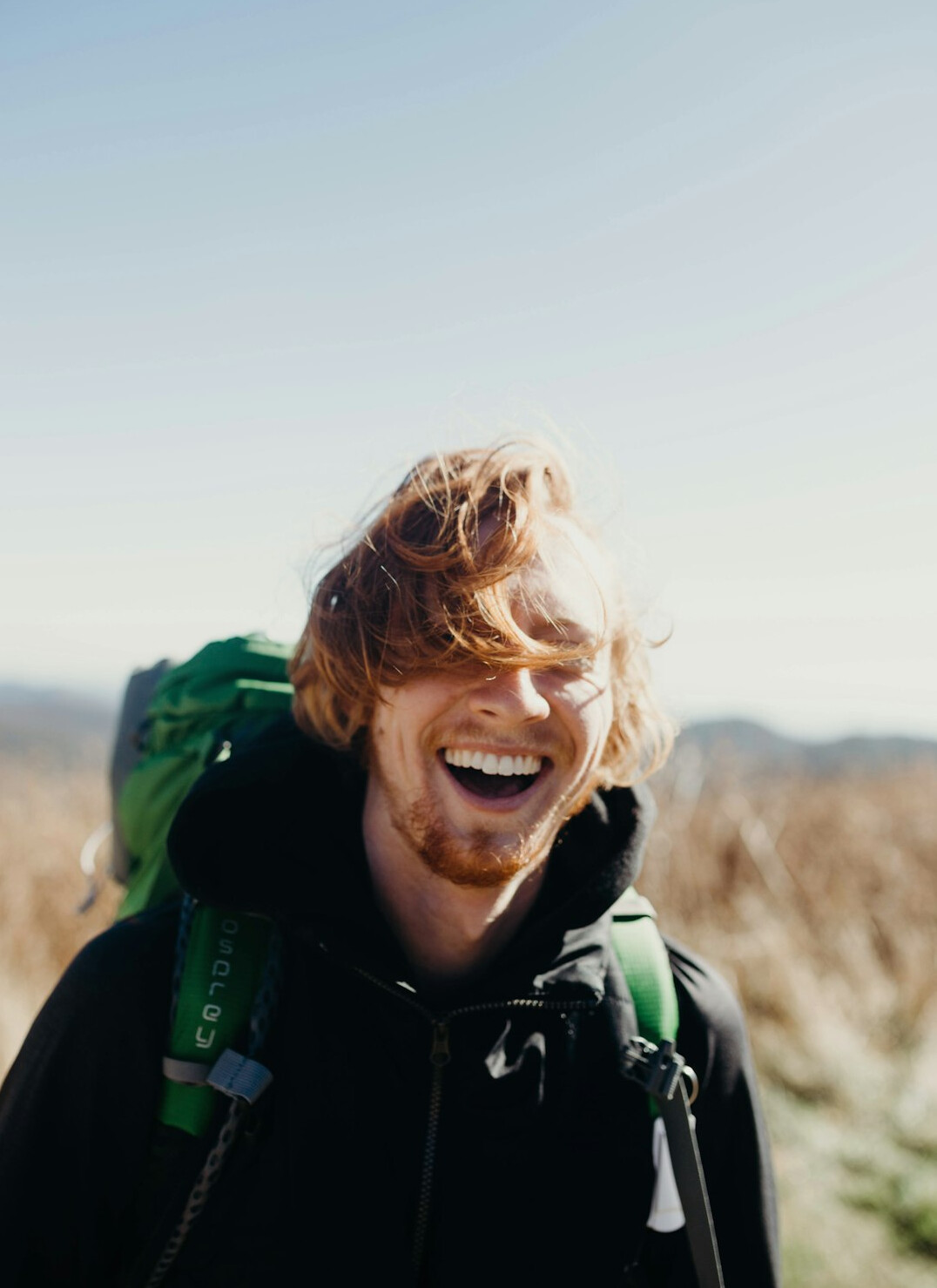 person achieving goal smiling